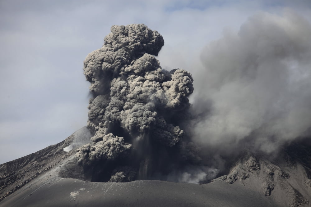 Dark ash cloud rising from Sakurajima volcano Japan Canvas Art - Richard RoscoeStocktrek Images (35 x 23)