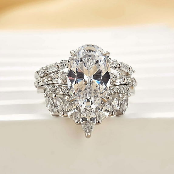 Dash Jewel 14k White Gold Plated Wedding Ring - 2.5 Ct Oval Cut VVS1/D Lab Created Simulated Diamond Women's Engagement Ring - Trio Set Wedding Ring for Her - A Perfect Gift for Her Special Day