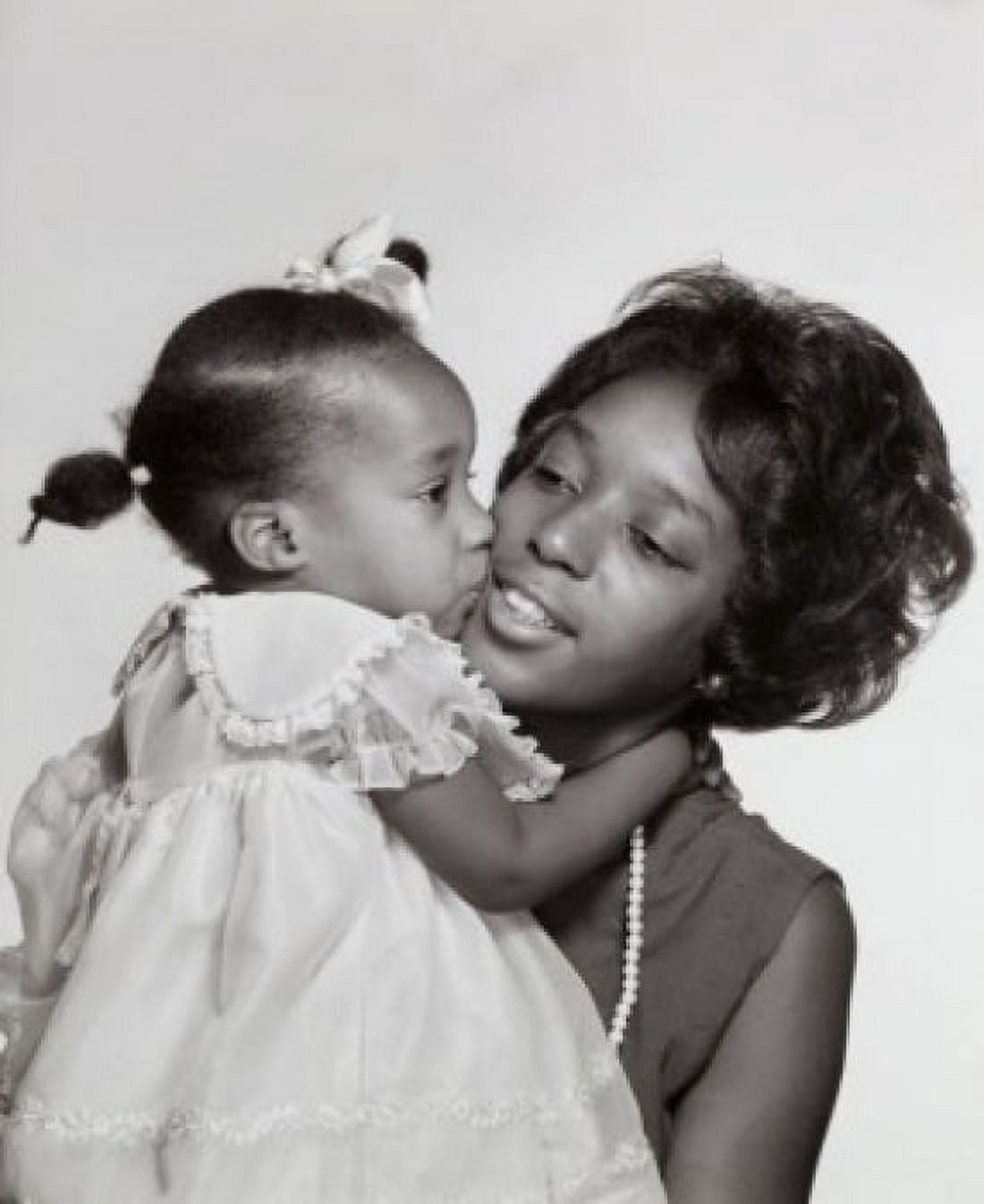 Daughter kissing her mother Canvas Art - (18 x 24)