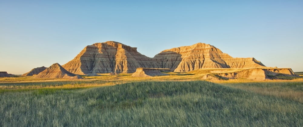 Dawn in badlands national park south dakota usa Canvas Art - Robert Postma Design Pics (44 x 20)