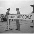 thumbnail image 1 of Day After Pearl Harbor Attack In San Francisco. Army Sentries Standing Guard At Transport Dock. Dec. 8 History, 1 of 2