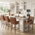 thumbnail image 1 of Dayalane Modern Farmhouse Bar Stools Set of 4, 26.5" Counter Height Bar Stools with Armrests, Faux Leather Upholstered & Solid Wood Legs Island Chairs for Dining Rooms Kitchens Pub, Brown, 1 of 12