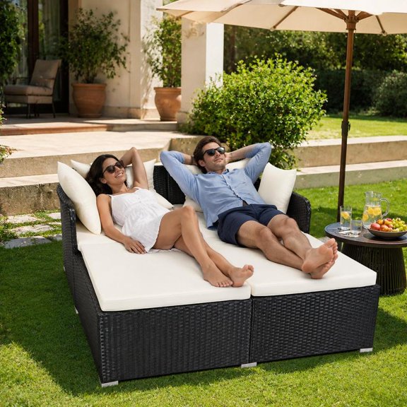 Daybed, white rattan construction, upholstered cushions, matching pillows, curved backrest, armrests, 800 lb load bearing capacity