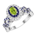 thumbnail image 1 of Dazzlingrock Collection 6X4mm Oval Peridot with Round Blue Sapphire & White Diamond Interweaving Double Halo Wedding Ring for Women in 10K White Gold, Size 4, 1 of 6