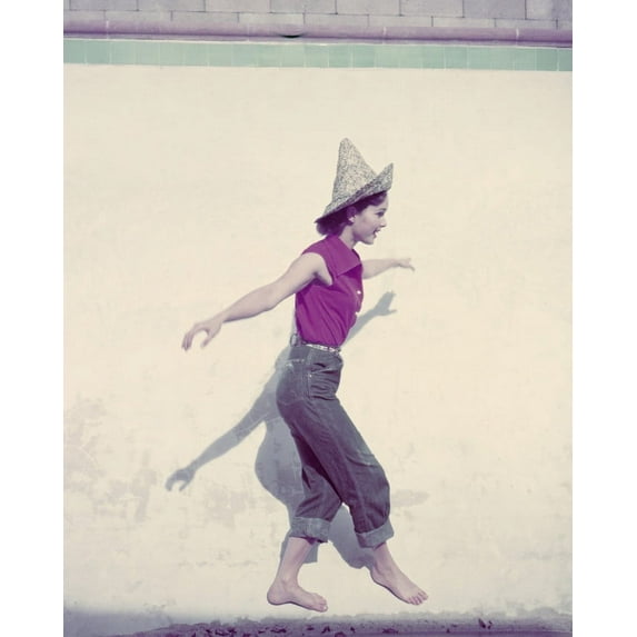 Debbie Reynolds Balancing Next To Wall In Straw Hat Jeans Sleeveless Blouse 24X36 Classic Hollywood Poster