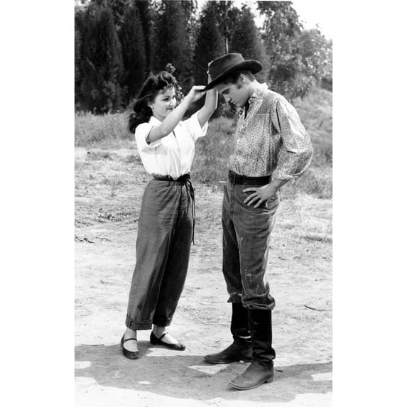 Debra Paget- Fixing Elvis Presleys's hat Photo Print (8 x 10) - Item # DAP16714