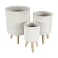 thumbnail image 1 of DecMode 12", 15", 17"H White Fiberclay Ceramic Planter with Wood Legs (3 Count), 1 of 14