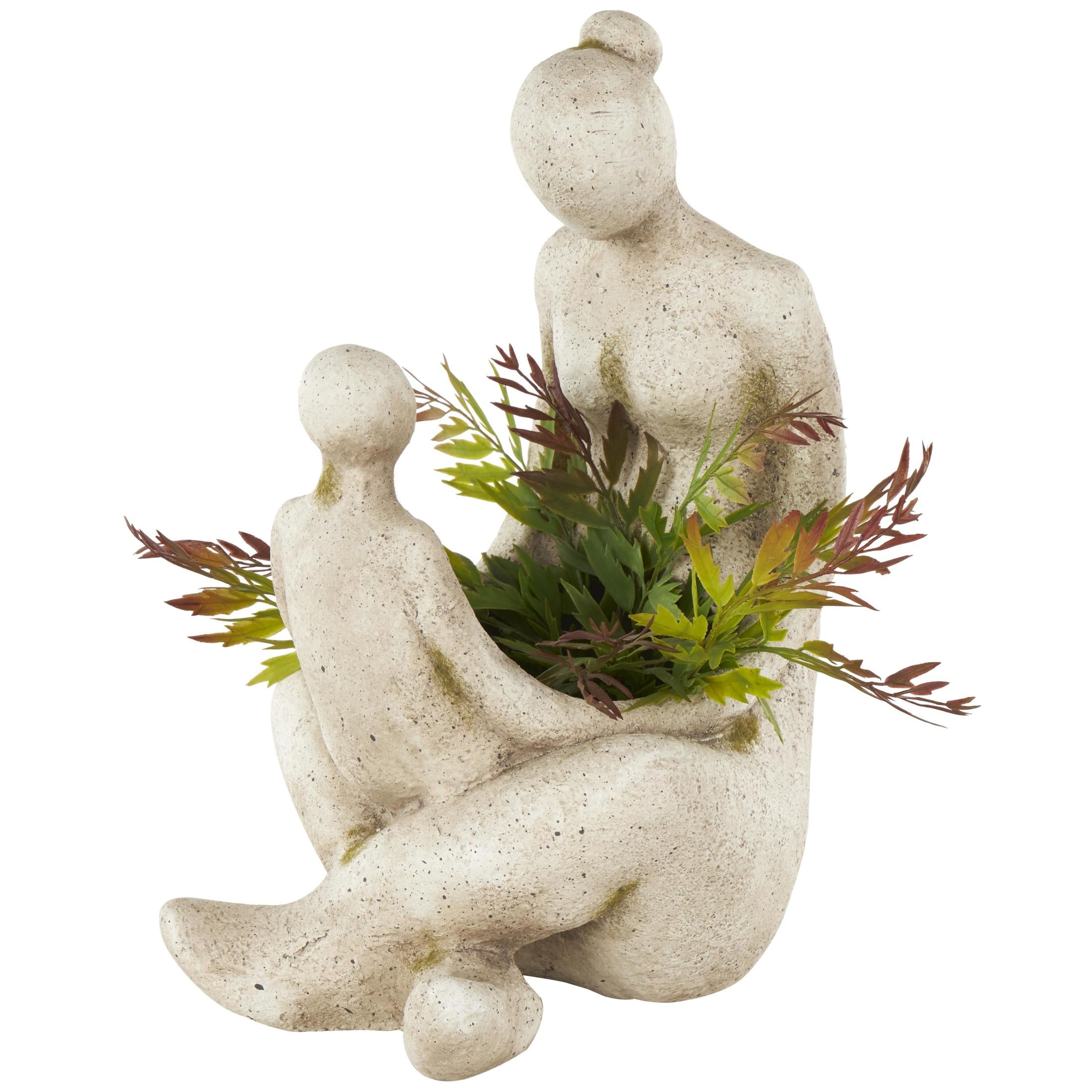DecMode 12" x 17" Sitting Cream Polystone Family Planter