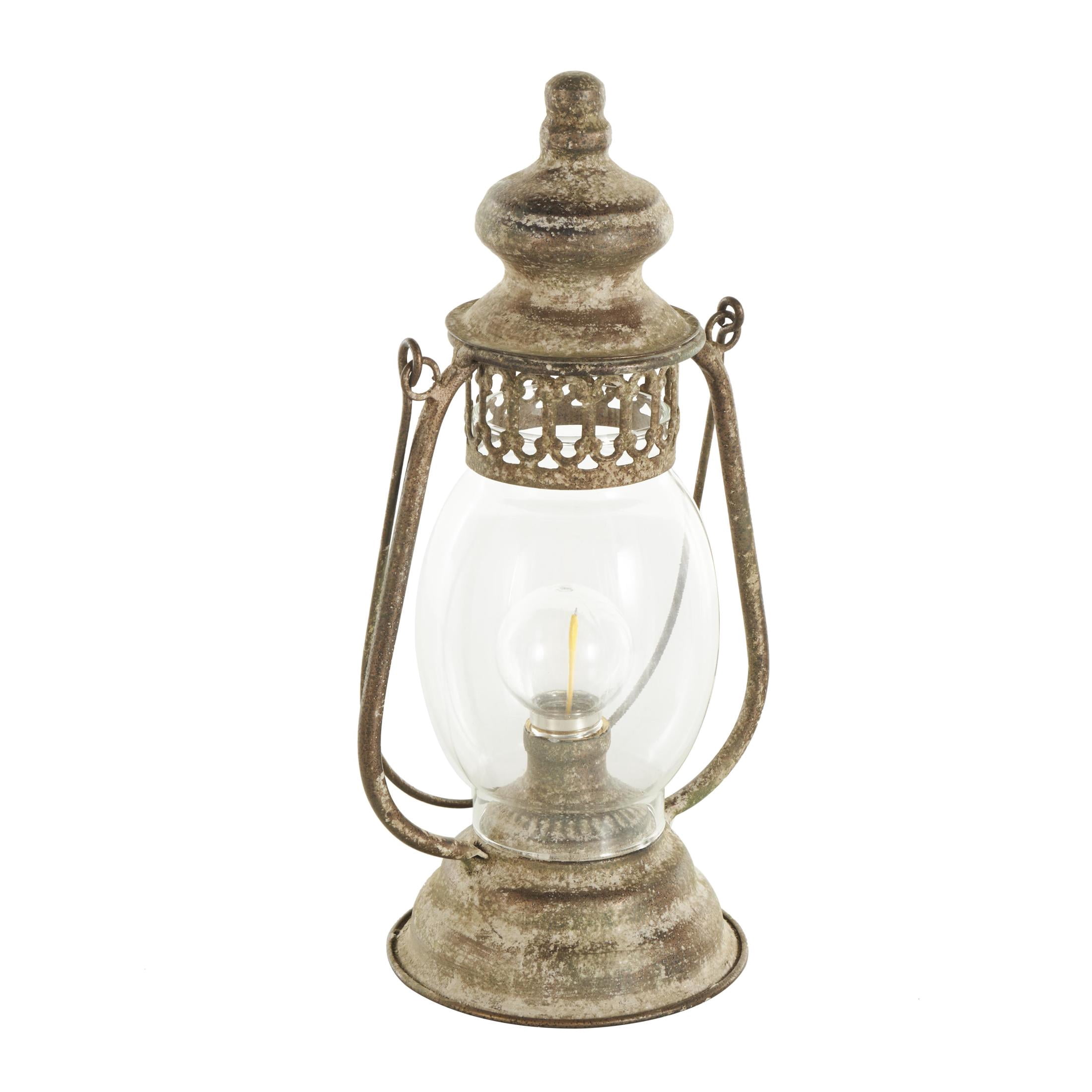 DecMode 17" Distressed Antique Style Lantern Bronze Accent Lamp with Clear Glass Shade