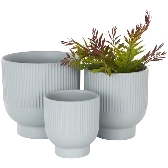 DecMode 9", 7", 5"W Light Blue Ceramic Planter with Linear Grooves and Tapered Bases (3 Count)