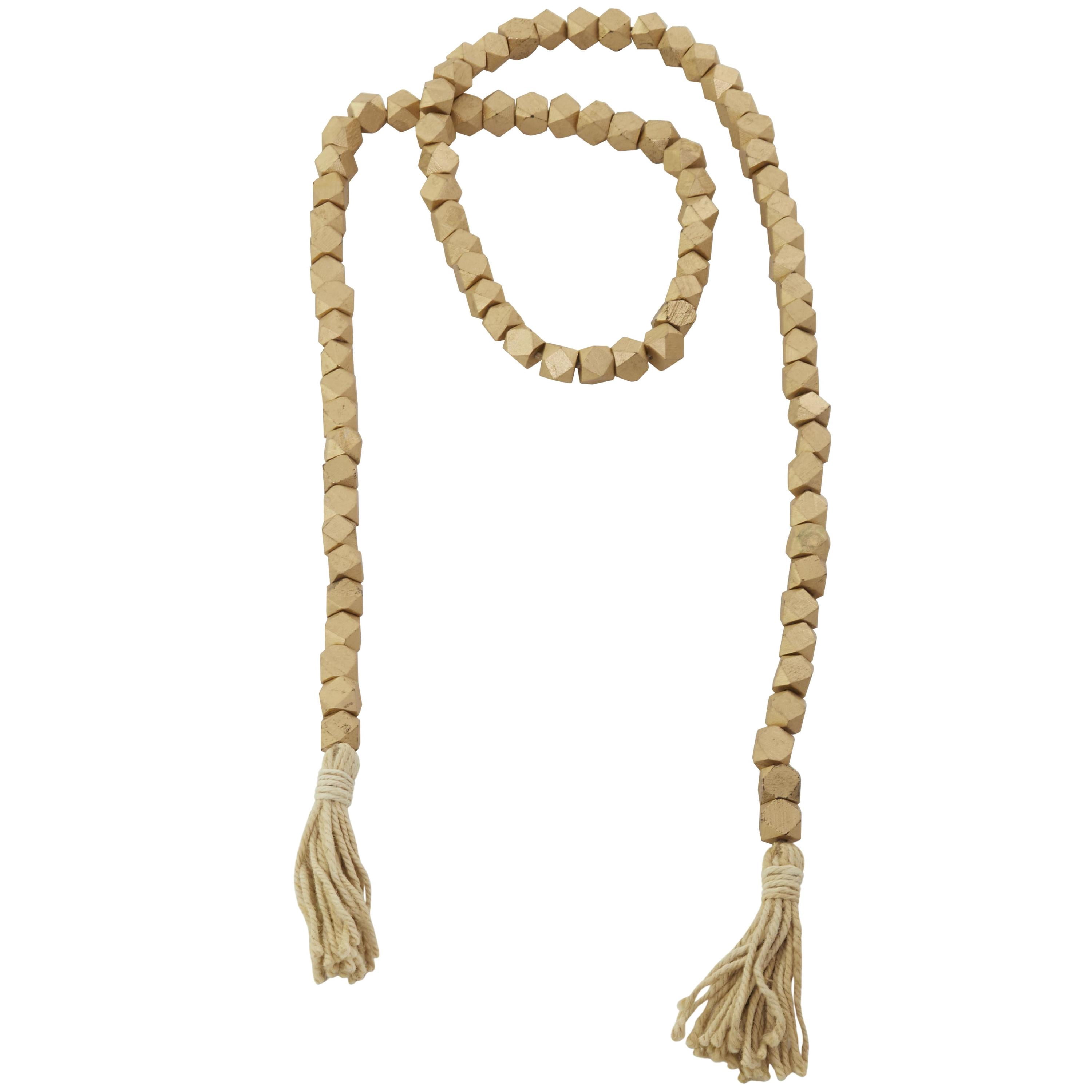 DecMode Handmade Hexagon Metallic Carved Geometric Long Gold Mango Wood Garland with Tassel