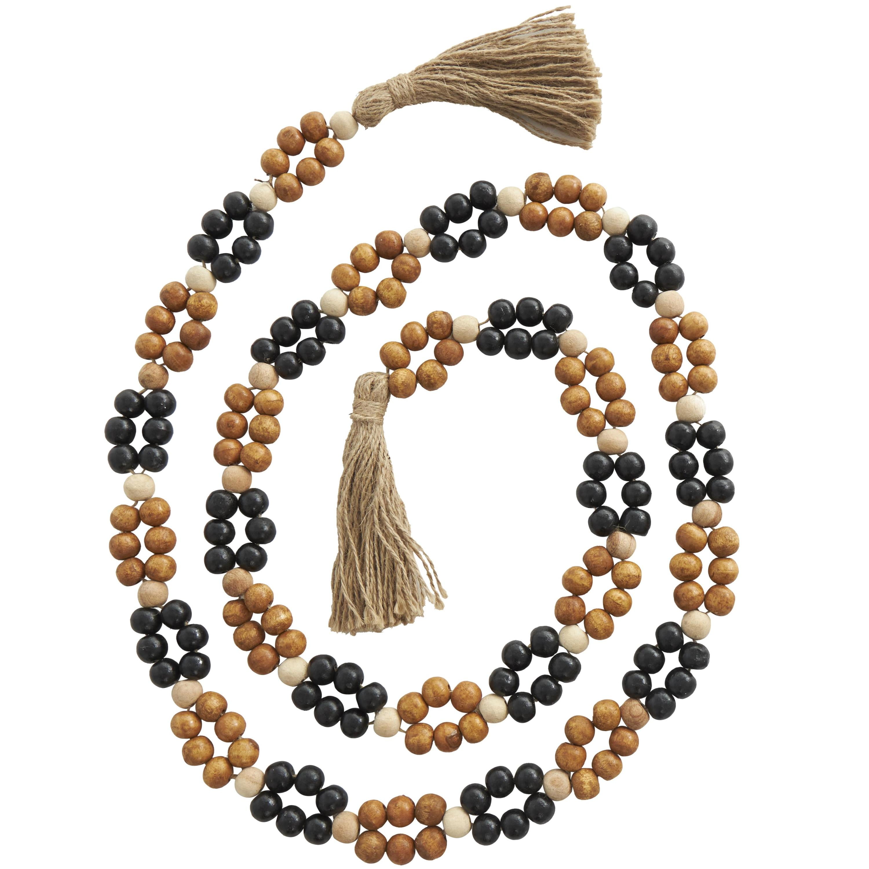 DecMode Handmade Round Double Layered Long Carved Brown Mango Wood Garland with Tassel with Black and Cream Accents