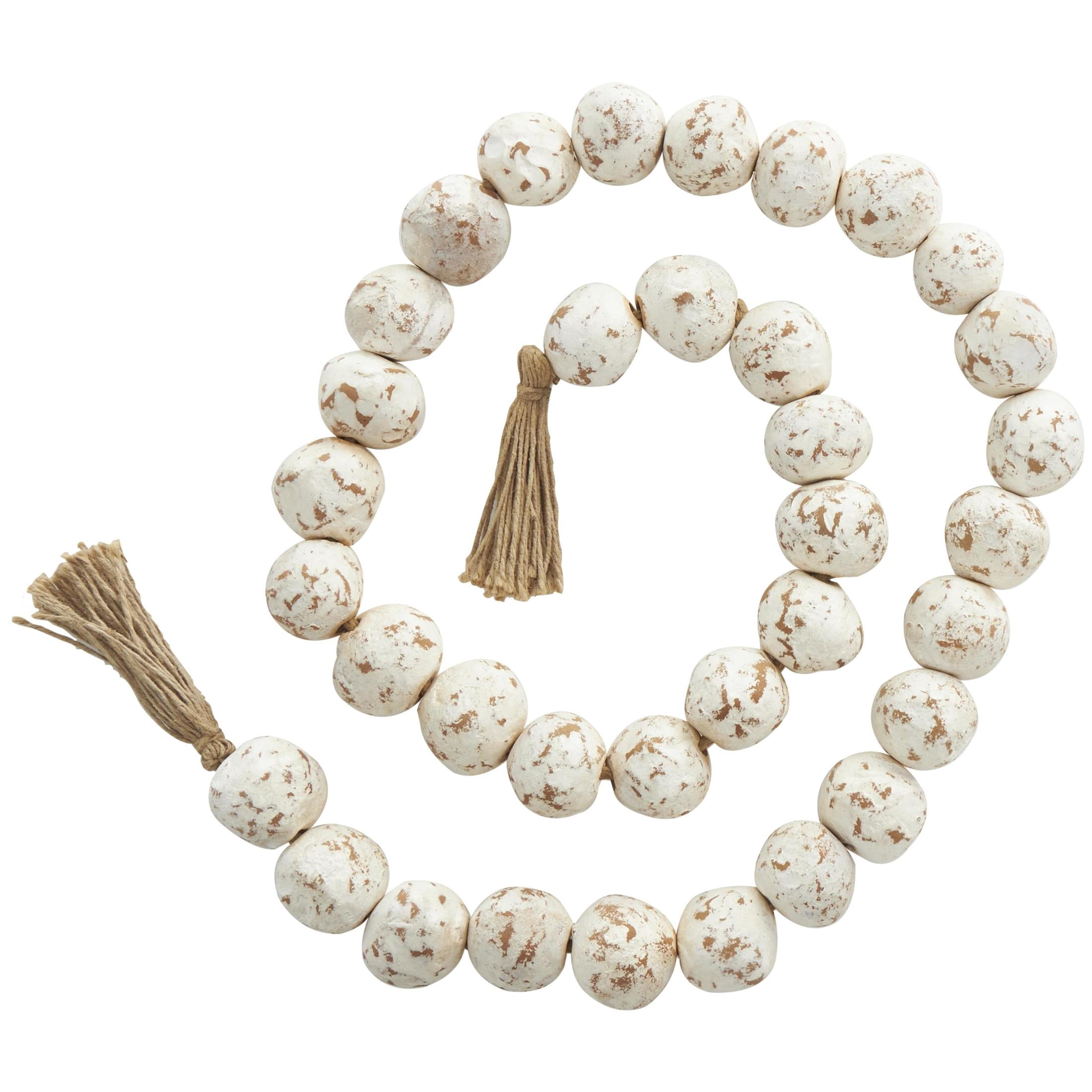 DecMode Handmade Round Intricately Shaped Large Distressed White Ceramic Garland with Tassel