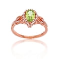 thumbnail image 1 of Decadence 14K Rose Gold 0.17 CTTW Round Diamond & 8x5mm Pear Cut Gemstone Knot Sides Ring, 1 of 4