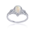 thumbnail image 1 of Decadence Sterling Silver Rhodium 0.17 CTTW Round Diamond & 8x5mm Pear Cut Gemstone Knot Sides Ring, 1 of 5