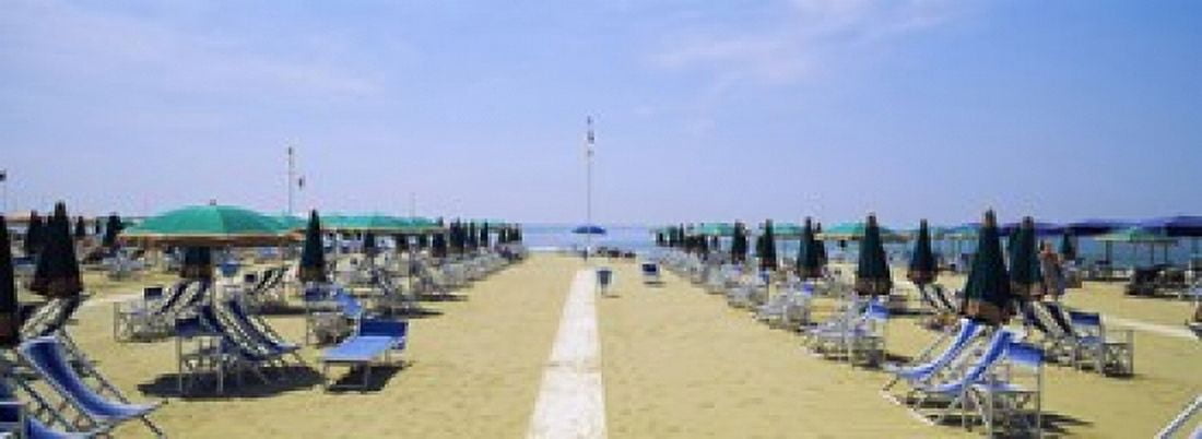 Deck chairs and umbrellas on the beach Viareggio Tuscany Italy Canvas Art - Panoramic Images (36 x 13)