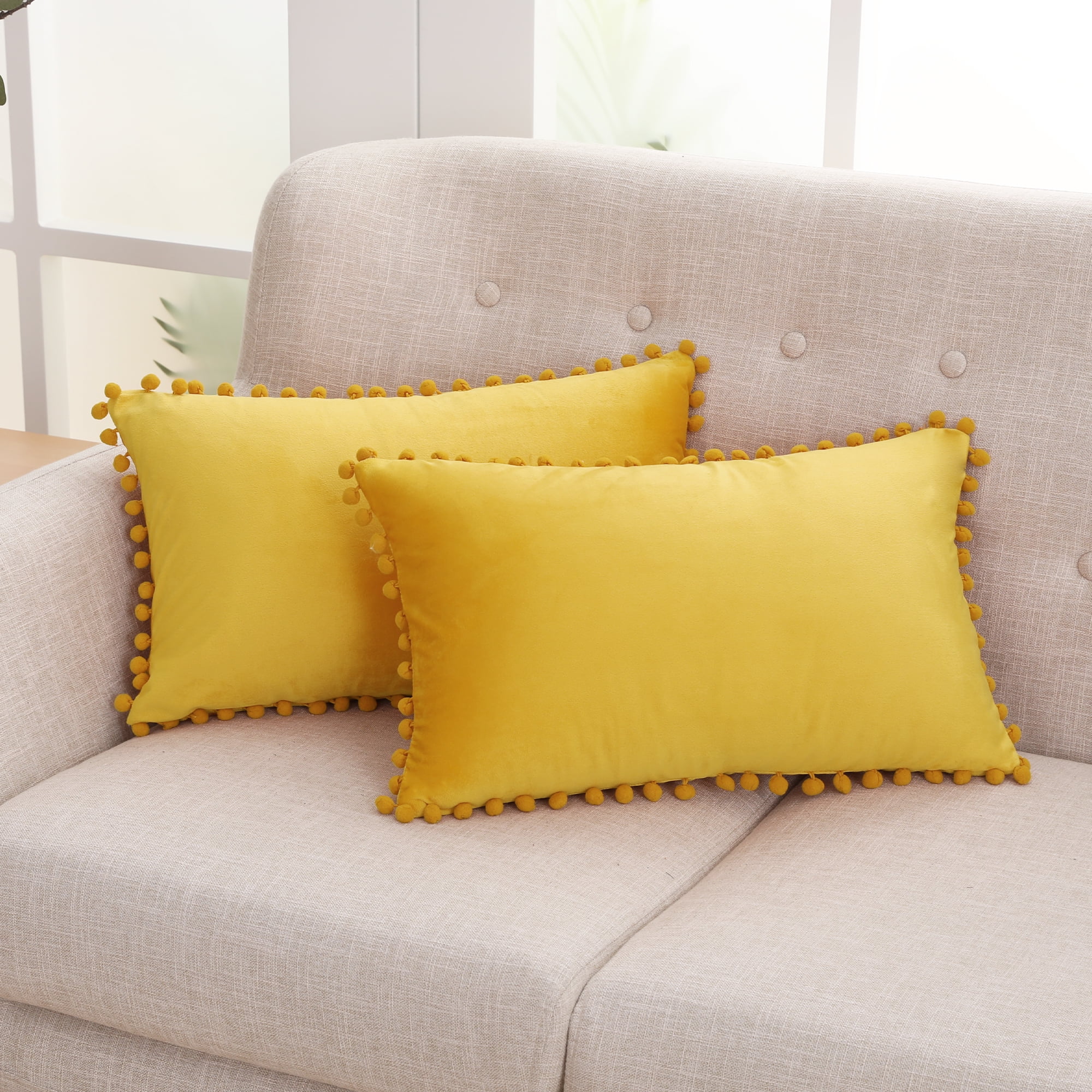 https://i5.walmartimages.com/seo/Deconovo-Lumbar-Pillow-Covers-Velvet-Decorative-Pillow-Covers-Short-Pom-Poms-Pillow-Covers-for-Couch-12x20-inch-Lemon-Yellow-Set-of-2_8599cec5-bfc2-4fca-9dac-6fc9e1e16ba3.9abeb8332338f732b73412df33447787.jpeg