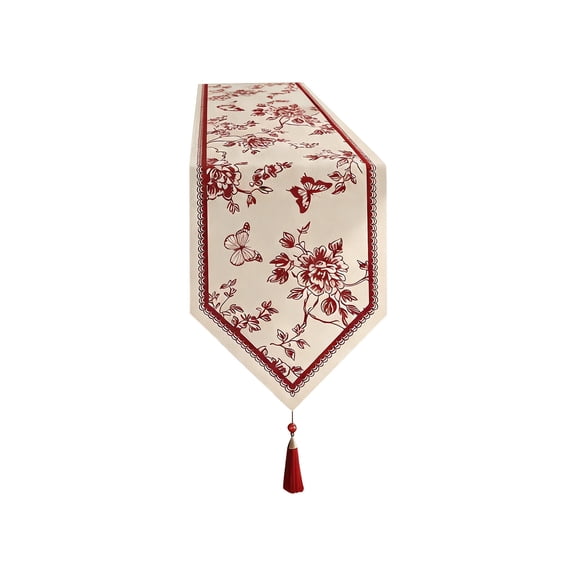 A Decorative Table Cover With Red Tassel Accents Designed For Coffee Tables Tv Stands And Countertops To Add A Festive Touch To Living And Dining Spaces During Seasonal Events