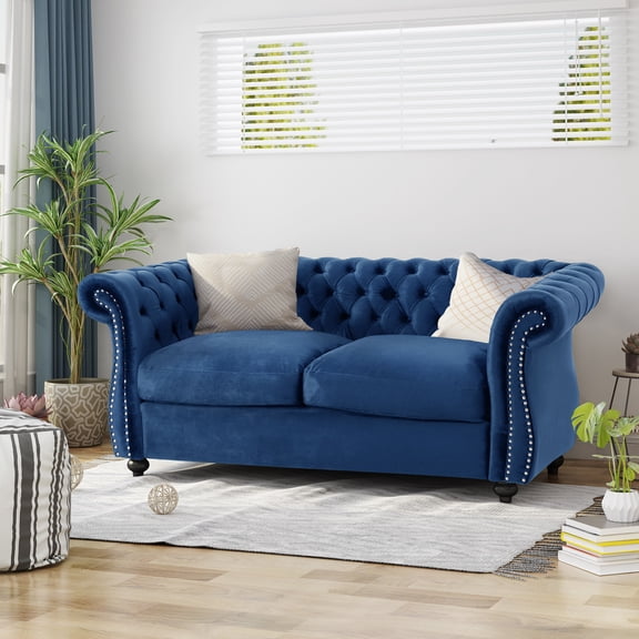 Deep Button In Navy Blue Velvet For A Cozy Seating Option Style Your Living Room