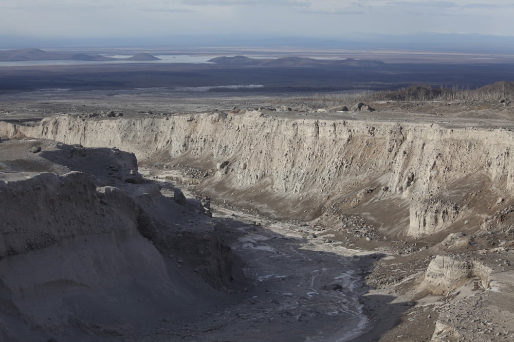 Deep erosion gulley in eroded pyroclastic flow deposits Shiveluch Volcano Canvas Art - Richard RoscoeStocktrek Images (35 x 23)