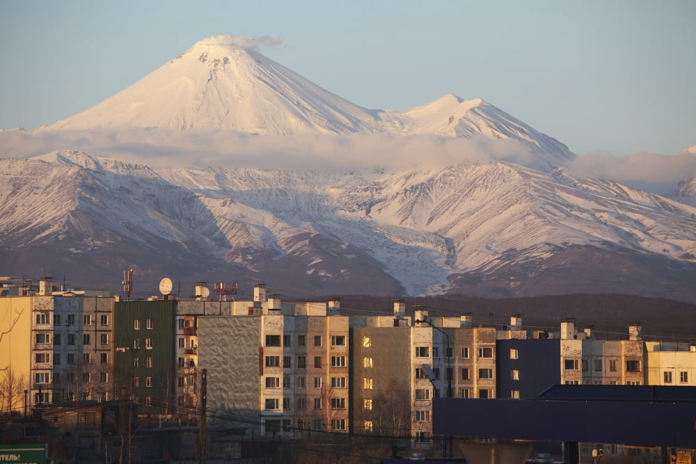 Degassing Avachinsky Volcano above the city of Petropavlovsk Russia Canvas Art - Richard RoscoeStocktrek Images (18 x 12)