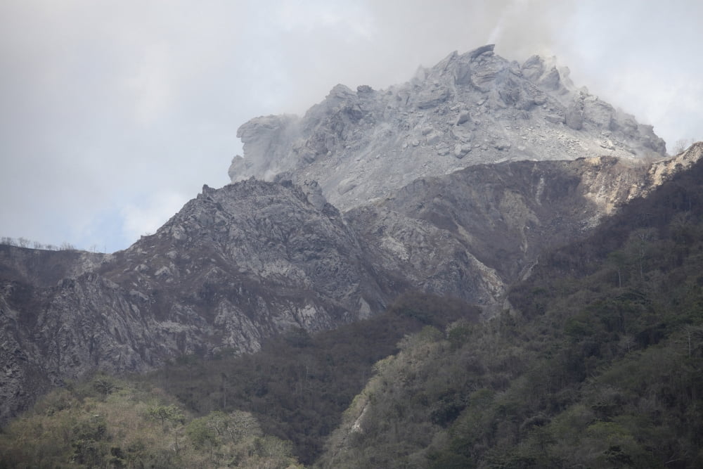 Degassing Rerombola lava dome of Paluweh volcano Flores Indonesia Canvas Art - Richard RoscoeStocktrek Images (35 x 23)