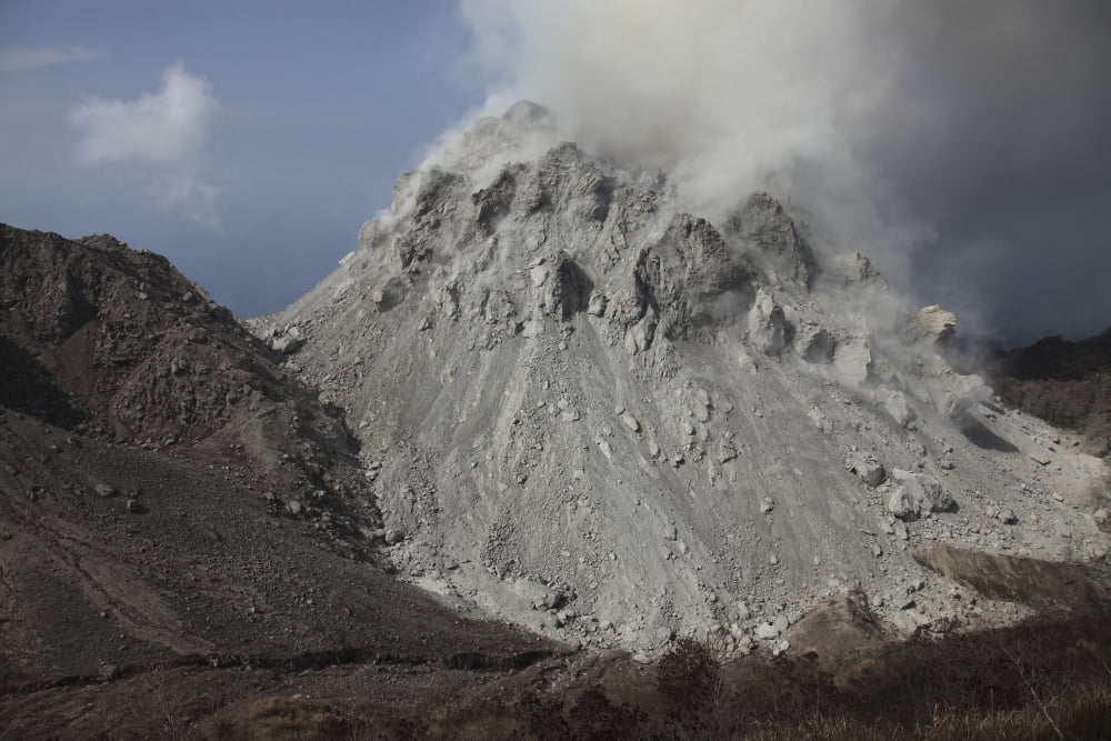 Degassing Rerombola lava dome of Paluweh volcano Indonesia Canvas Art - Richard RoscoeStocktrek Images (18 x 12)