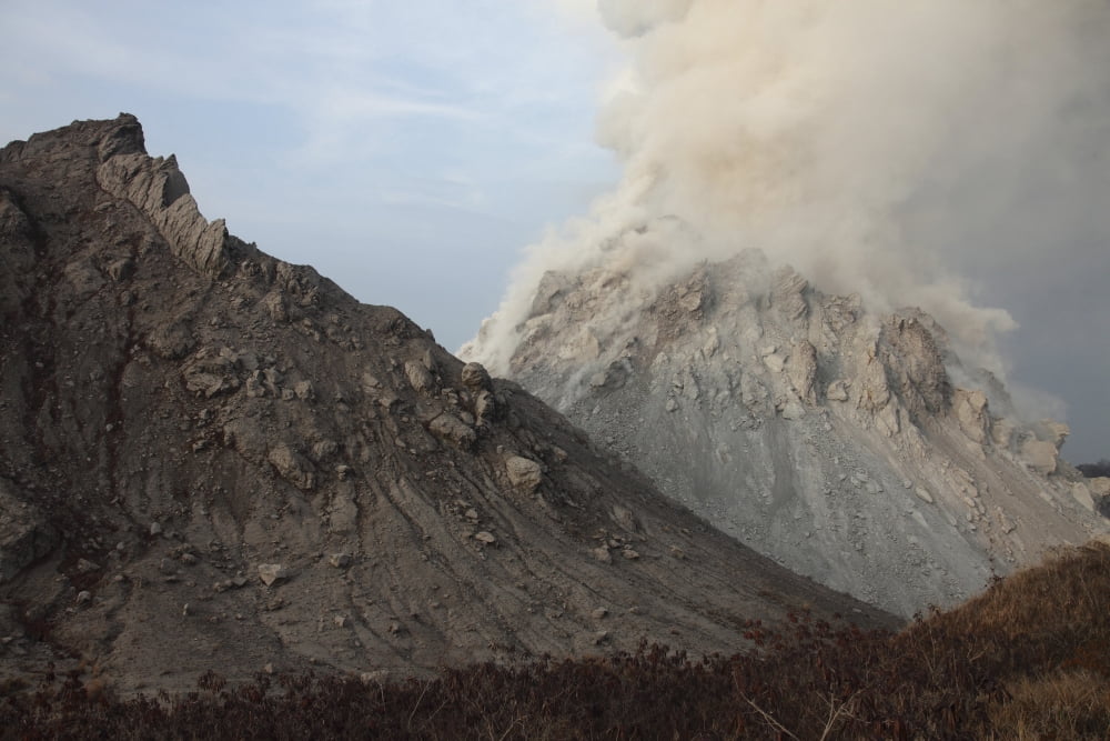 Degassing Rerombola lava dome of Paluweh volcano Indonesia Canvas Art - Richard RoscoeStocktrek Images (18 x 12)