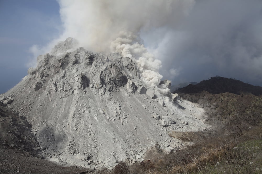 Degassing Rerombola lava dome of Paluweh volcano Indonesia Canvas Art - Richard RoscoeStocktrek Images (35 x 23)