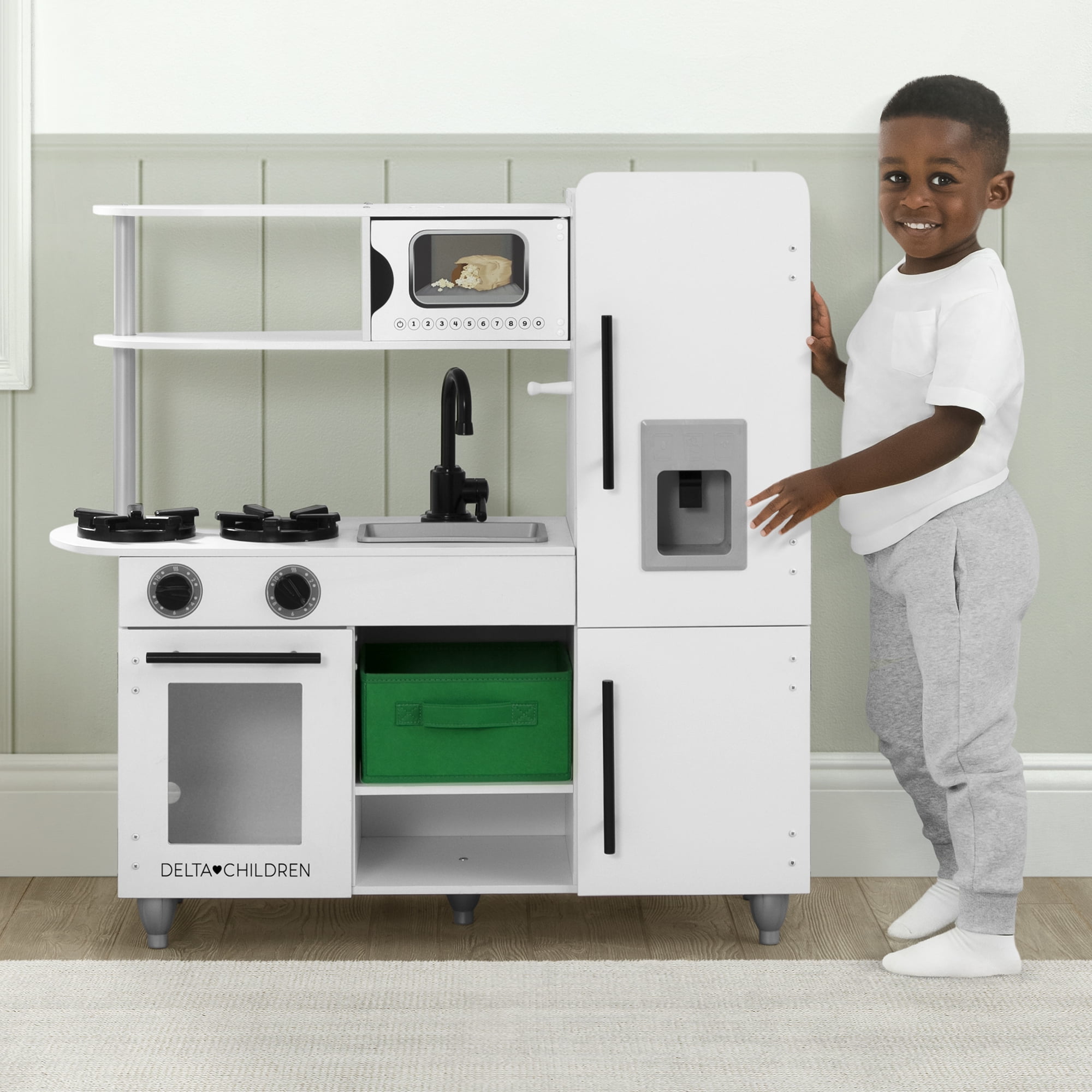Delta Children Deluxe Modern Kitchen - Wooden Toy Kitchen Playset with Realistic Knobs that Turn/Click, Oven, Sink and Fridge/Freezer with Ice Maker, White