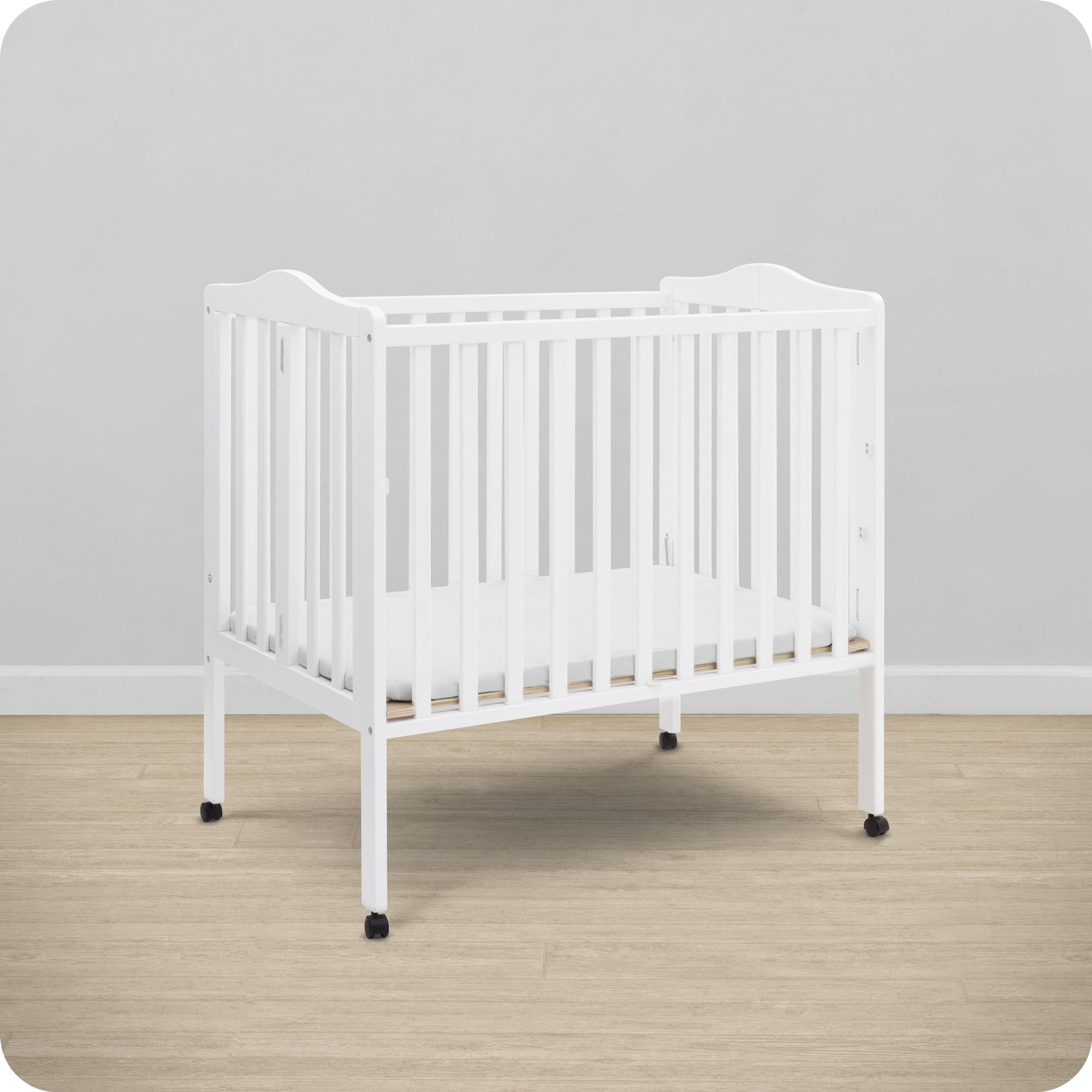 Delta Children Folding Portable Baby Mini Crib with 1.5-inch Mattress