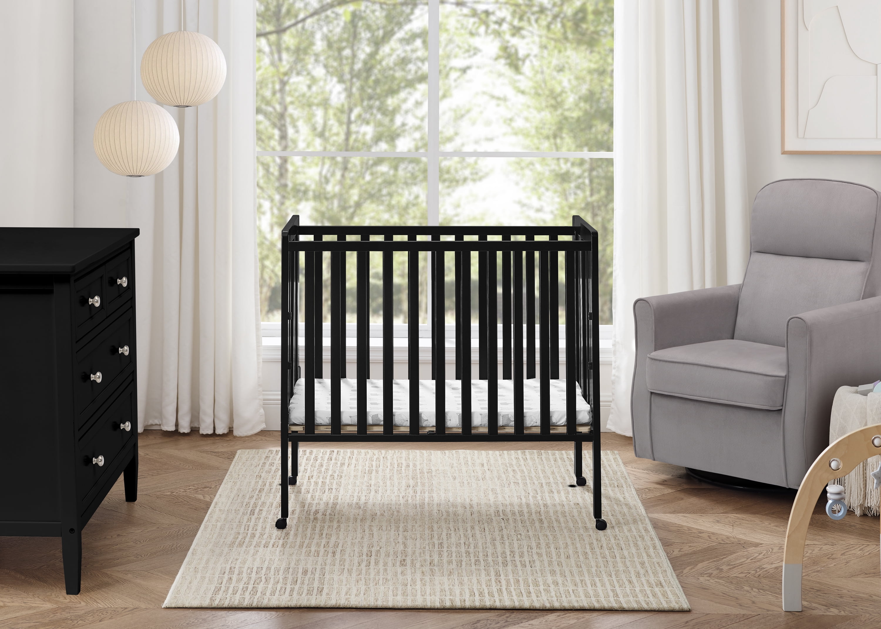 Delta Children Lee Portable Folding Mini Crib with 1.5-Inch Mattress - Greenguard Gold Certified, Black