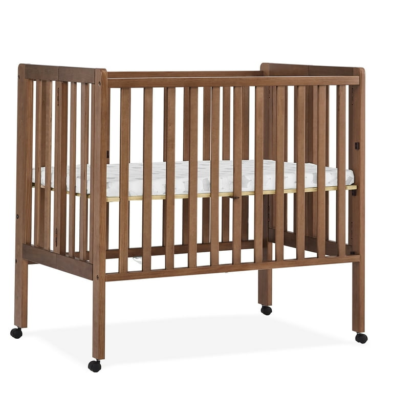 Delta Children Lee Portable Folding Mini Crib with Mattress  Greenguard Gold Certified, Chestnut