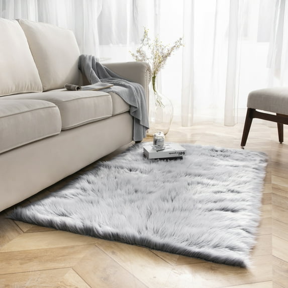 Deluxe Ultra Soft Faux Sheepskin Fur Series Fluffy Decorative Indoor Shag Area Rug, 6 x 9 Feet Rectangle, Black and White, 1 Pack