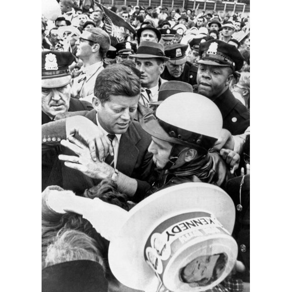 Democratic Presidential Nominee John Kennedy Campaigning. Police Help Him To His Car Through A Crowd Of Supporters In