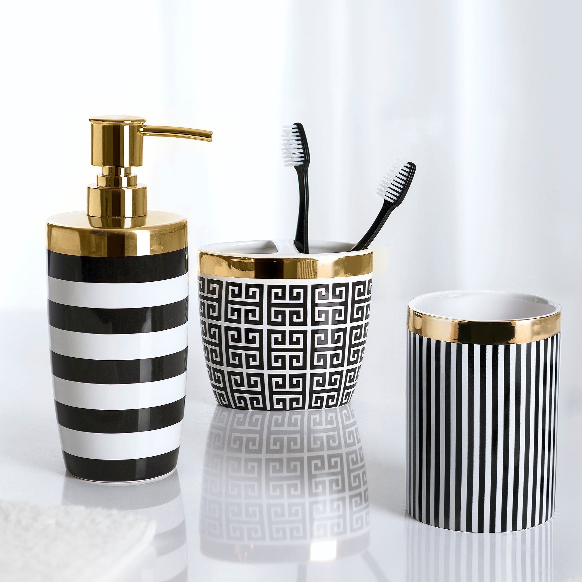 Black and White Ceramic Bathroom Accessory Set with Gold Accents