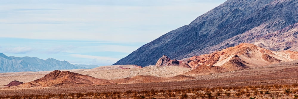 Desert with mountain range in the background Death Valley Death Valley National Park California USA Canvas Art - Panoramic Images (36 x 12)