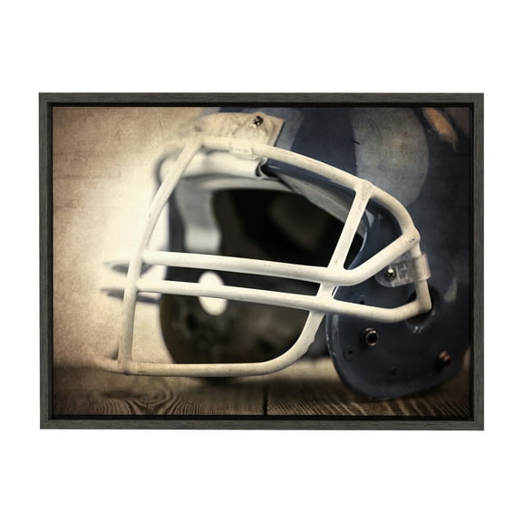 DesignOvation Sylvie Vintage Football Helmet Framed Canvas By Shawn St. Peter, 18x24 Dark Grey, Transitional Sports Wall Decor For Office, Bedroom, Or Living Room