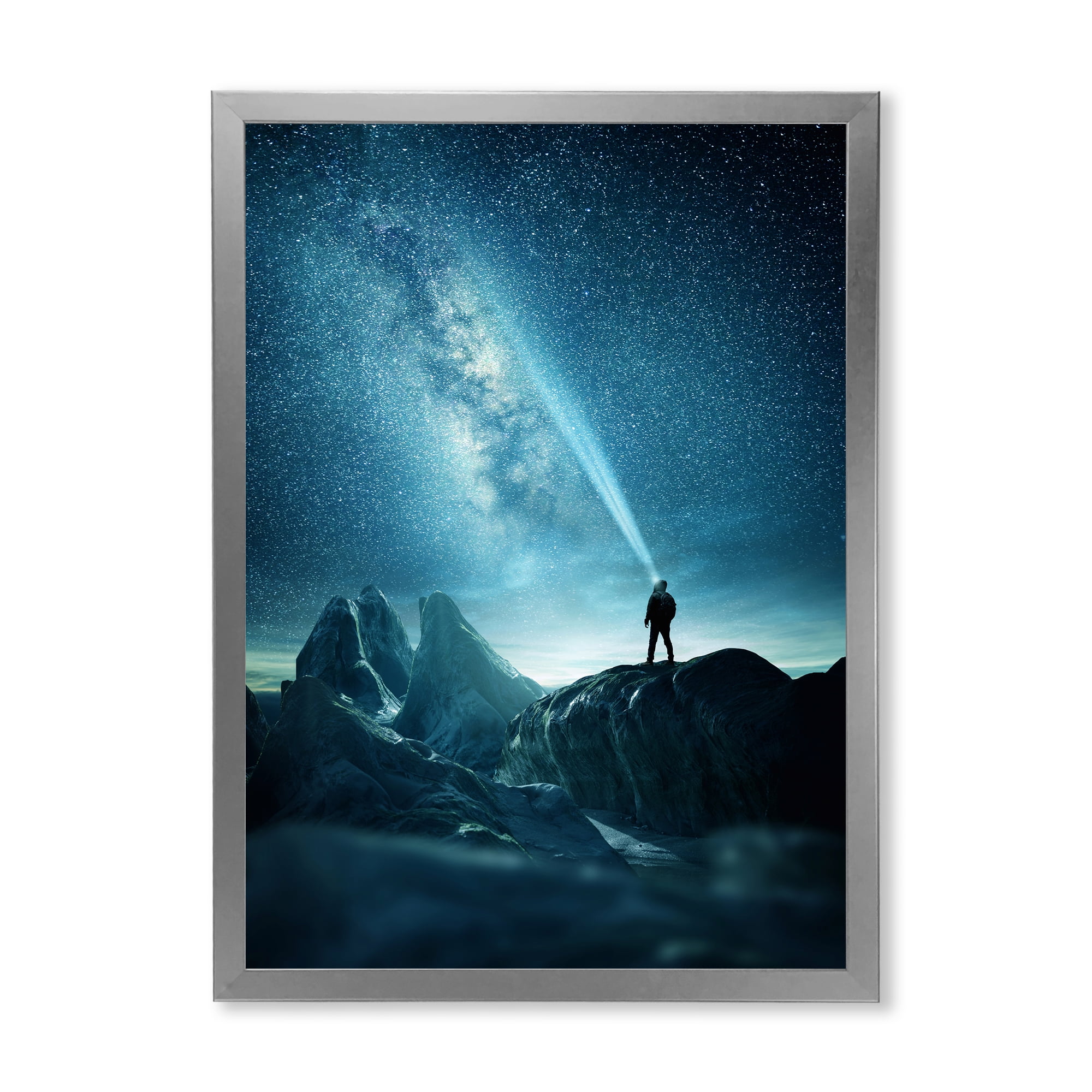 Designart 'A Light Shining by A Man Shining Into The Night Sky' Modern Framed Art Print