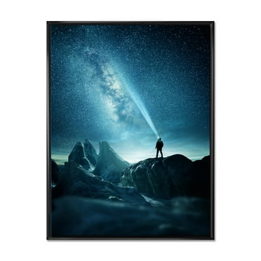 Designart 'A Light Shining by A Man Shining Into The Night Sky' Modern Framed Canvas Wall Art Print