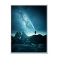 thumbnail image 1 of Designart 'A Light Shining by A Man Shining Into The Night Sky' Modern Framed Canvas Wall Art Print, 1 of 5