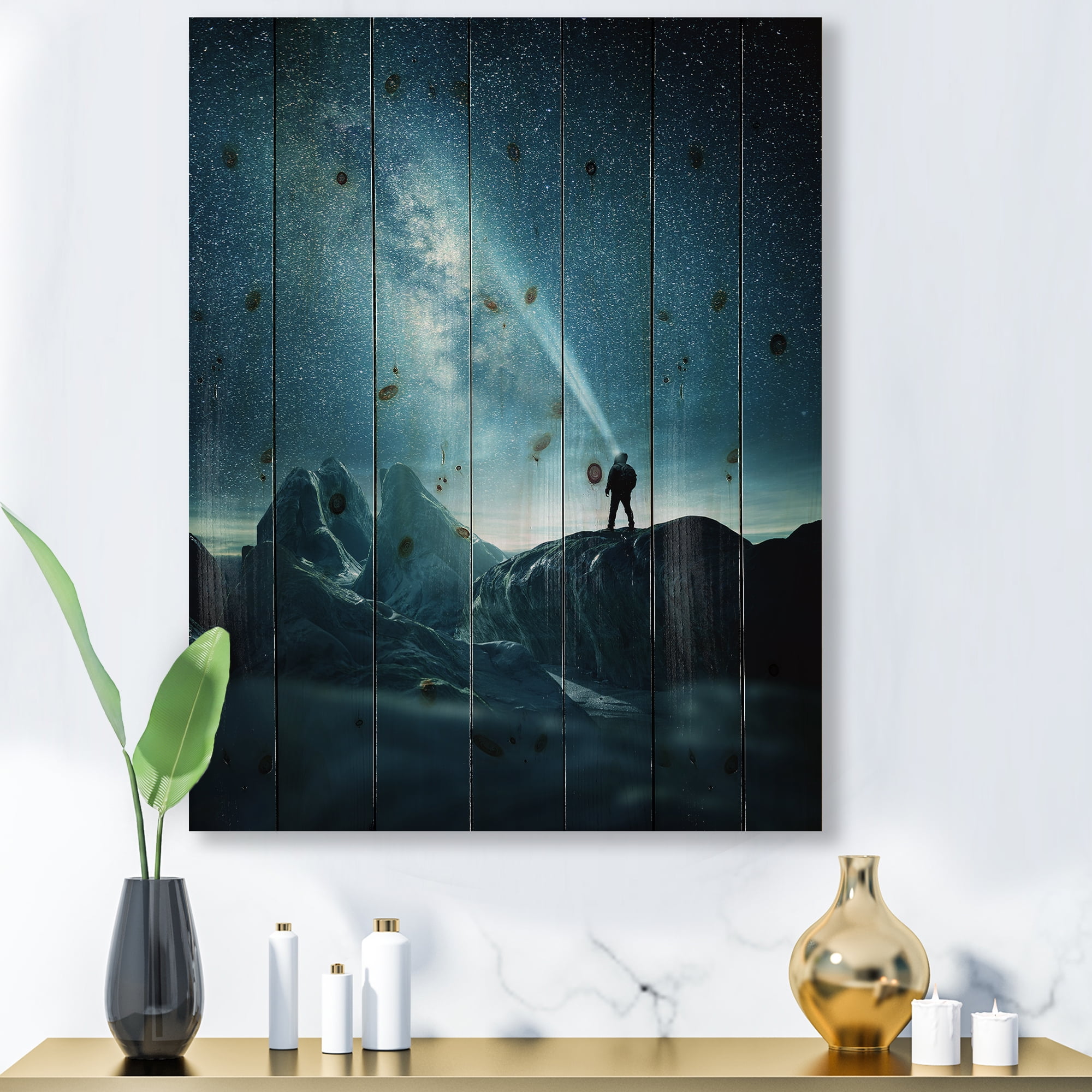 Designart 'A Light Shining by A Man Shining Into The Night Sky' Modern Print on Natural Pine Wood