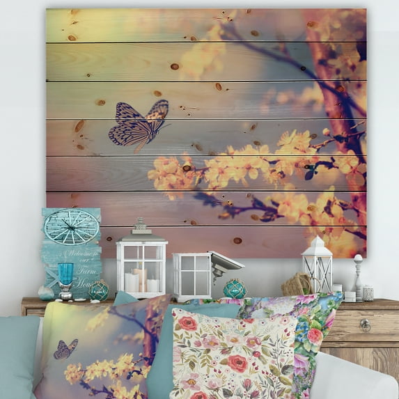 Designart 'Ancient Butterfly Flying To A White Flower' Traditional Print on Natural Pine Wood