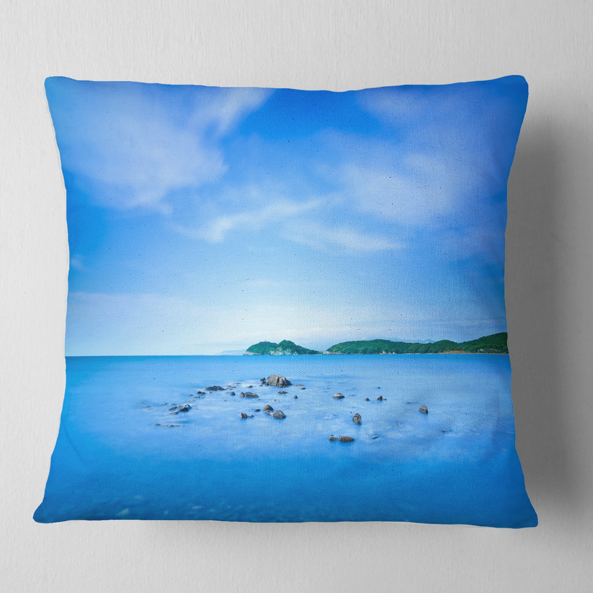 Designart Baratti Bay Small Rocks in Blue Sea - Seashore Throw Pillow - 18x18
