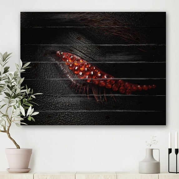 Designart 'Beautiful Black Skin Female Eye With Red Diamonds' Modern Print on Natural Pine Wood