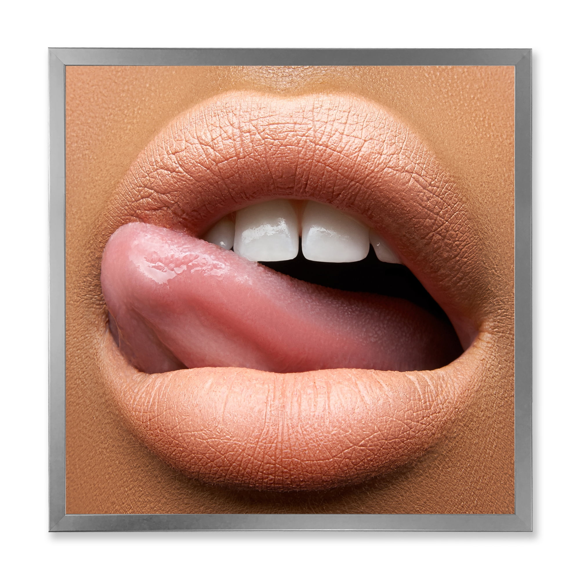 Designart 'Beautiful Dark Skinned Female Tongue Touching Lips' Modern Framed Art Print