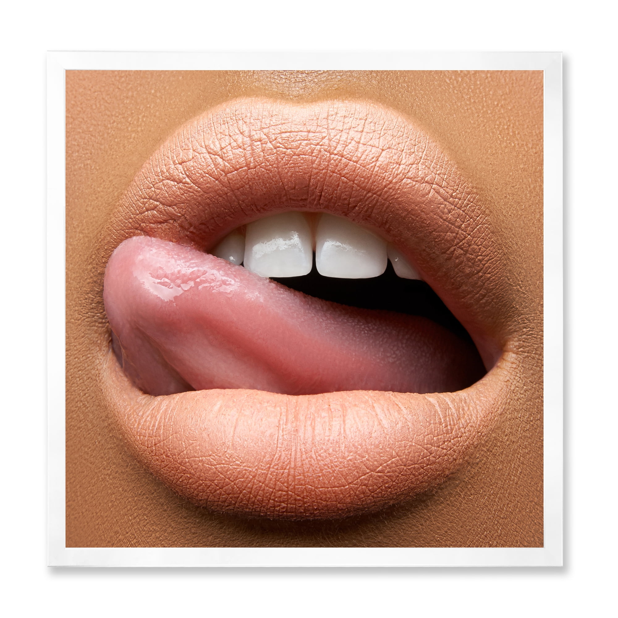 Designart 'Beautiful Dark Skinned Female Tongue Touching Lips' Modern Framed Art Print