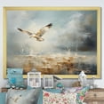 thumbnail image 1 of Designart "Bird Soaring Above the Ocean in Gold II" Animals Framed Wall Art Decor - Traditional Gold Bird Tree Living Room Framed Canvas Art, 1 of 6