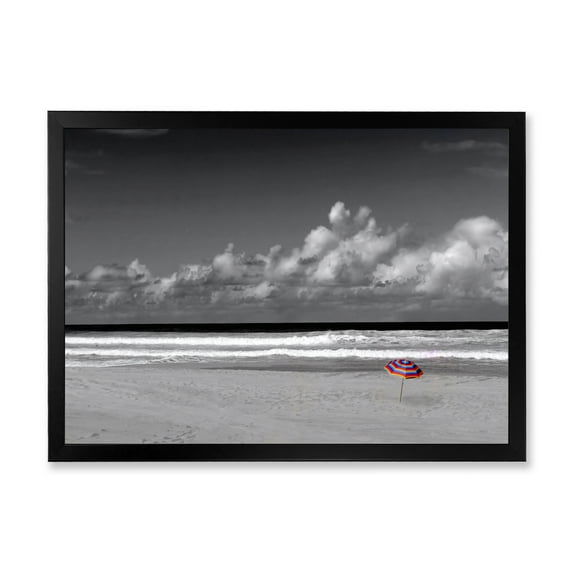 Designart 'Black and White Coastline Under Cloudy Sky' Lake House Framed Art Print