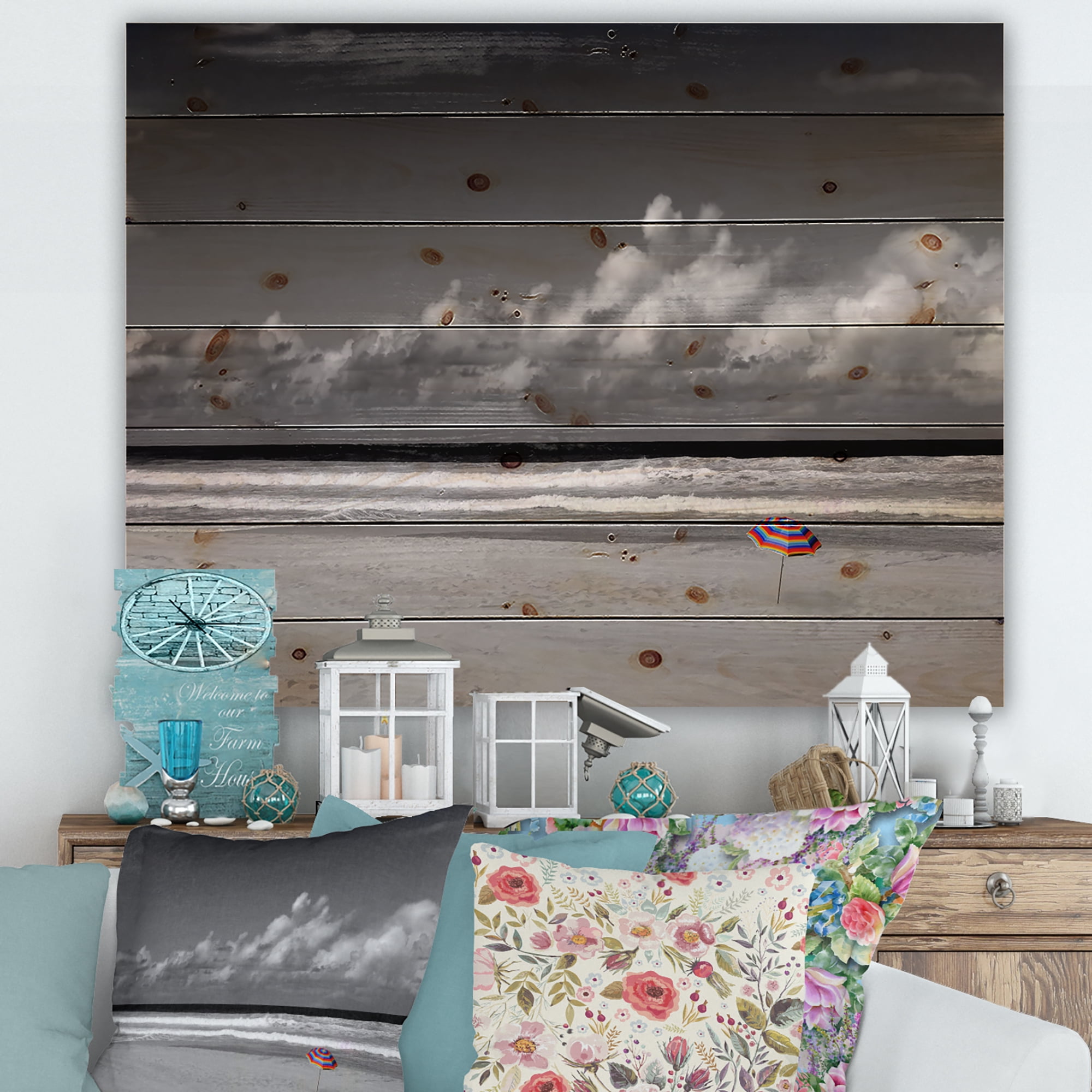 Designart 'Black and White Coastline Under Cloudy Sky' Lake House Print on Natural Pine Wood
